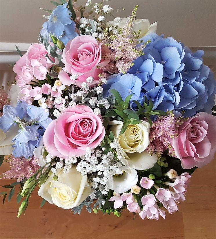 pink and blue brides bouquet 