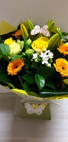 florist choice handtied to include yellows
